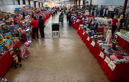 henrico christmas mother warehouse set up for shopping